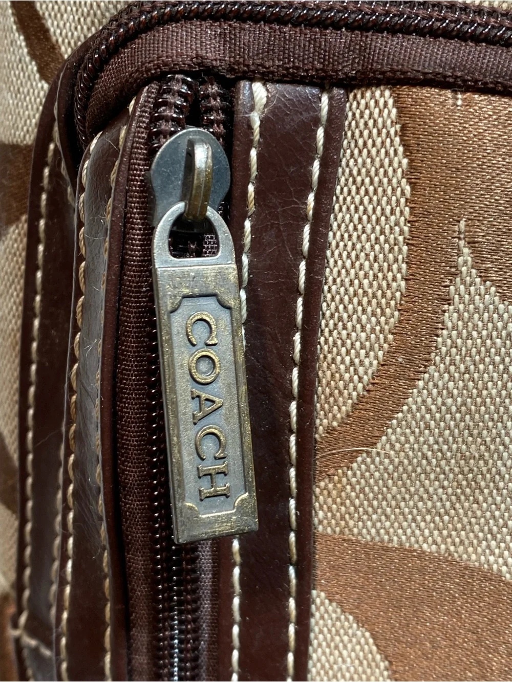 C Brown and Tan Signature Canvas Backpack